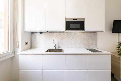 Kitchen or kitchenette, stove