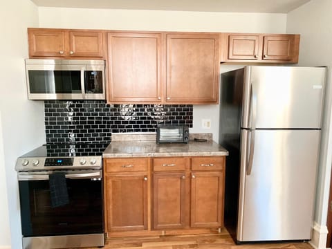 Kitchen or kitchenette, oven, stove, toaster