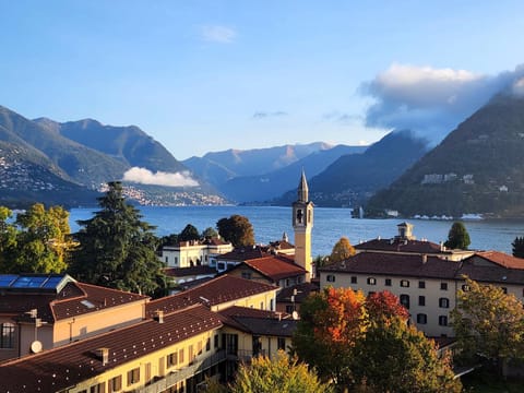 Property building, Natural landscape, Lake view, Mountain view