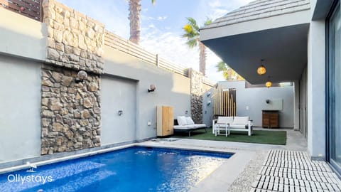 Patio, Seating area, Pool view, Swimming pool, sunbed