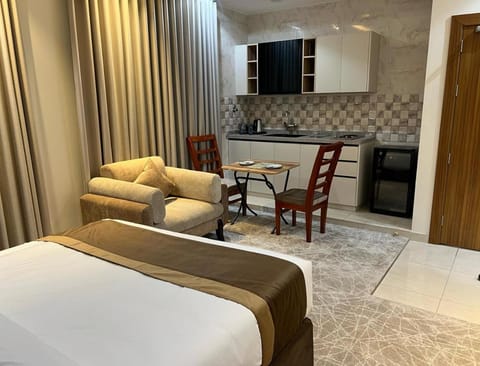 Bed, Seating area, Dining area, Bedroom