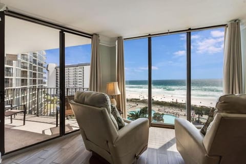 Day, View (from property/room), Balcony/Terrace, Living room, Seating area, Beach, Sea view