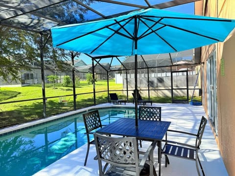 Patio, Day, Dining area, Pool view, Swimming pool, sunbed