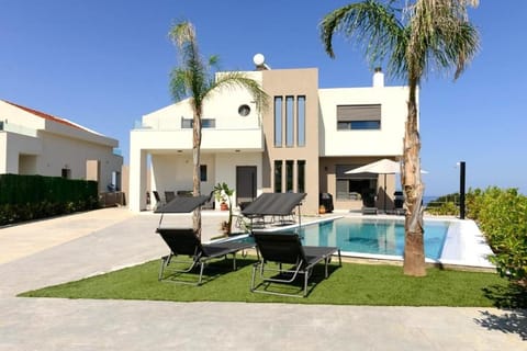 Property building, Patio, Day, Living room, Seating area, Dining area, Pool view, Swimming pool, sunbed
