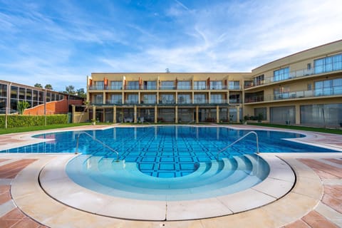 Property building, Living room, Swimming pool