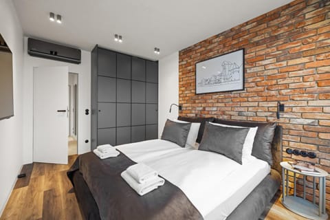 Bed, Bedroom, towels, wardrobe, air conditioner