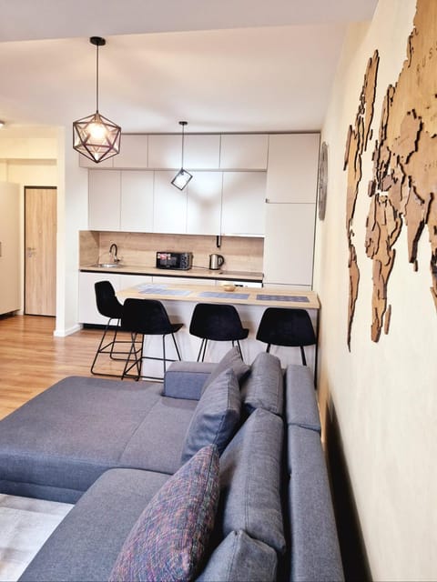 Kitchen or kitchenette, Living room, Seating area, Dining area