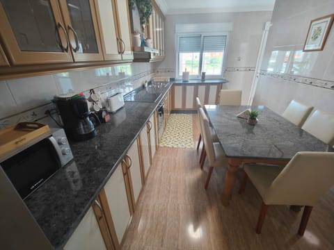 Kitchen or kitchenette, stove, kitchen