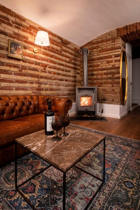 Living room, Food and drinks, Seating area, Drinks, Alcoholic drinks, fireplace, fireplace