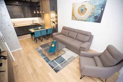 Kitchen or kitchenette, Living room, Seating area, Dining area