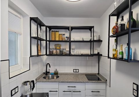 Kitchen or kitchenette, stove