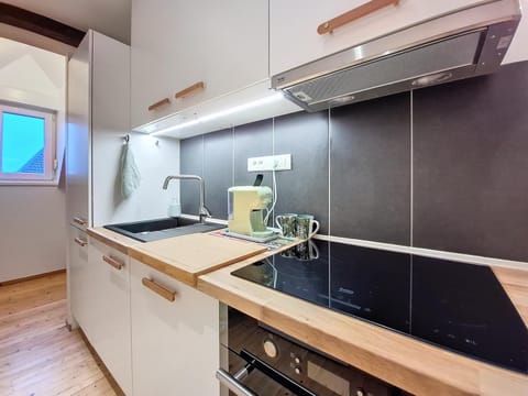 Kitchen or kitchenette, stove