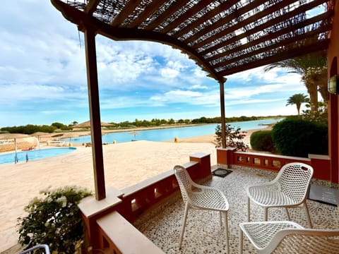 Patio, Day, Natural landscape, Pool view, Swimming pool, sunbed