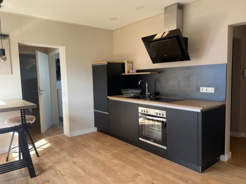 Kitchen or kitchenette, oven, stove, toaster