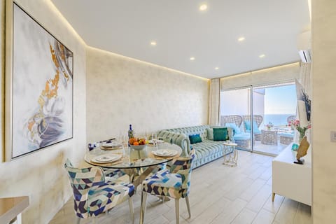 View (from property/room), Balcony/Terrace, Living room, Dining area, Mountain view, Sea view