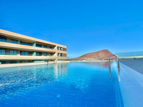 Property building, Natural landscape, Swimming pool, Swimming pool