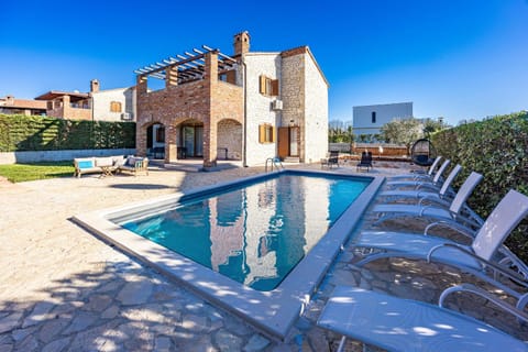 Property building, Patio, Swimming pool, sunbed