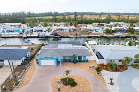 Canalfront Bradenton home with Dock & Heated Screened In Pool House in Cortez