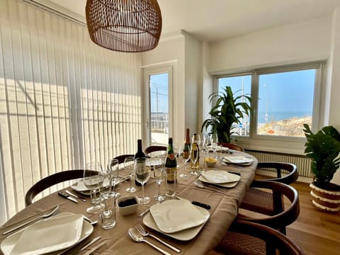 Natural landscape, Living room, Seating area, Dining area, Sea view