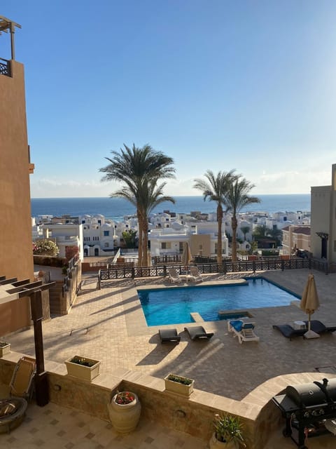 Patio, Sea view, Swimming pool, sunbed