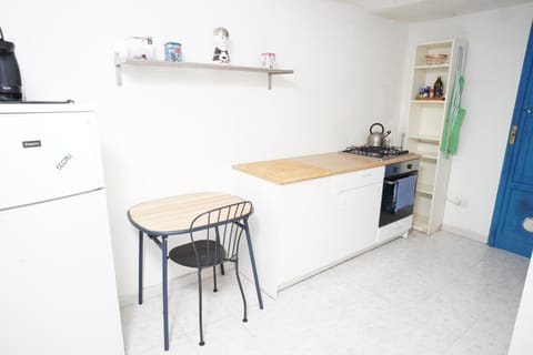 Kitchen or kitchenette, oven, stove