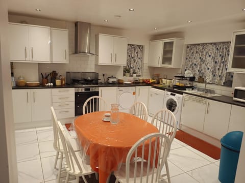 Kitchen or kitchenette, Dining area, dishwasher, oven, stove, toaster