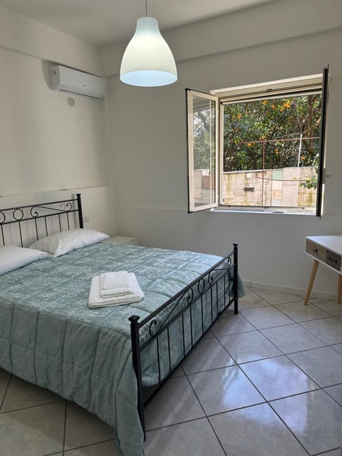 Bed, Photo of the whole room, Bedroom, towels, air conditioner