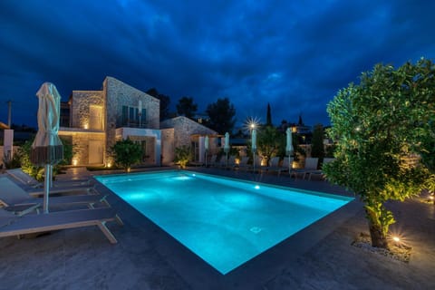 Property building, Night, Pool view, Swimming pool, sunbed