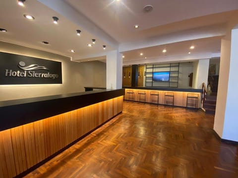 Communal lounge/ TV room, Property logo or sign, Lobby or reception, Lounge or bar