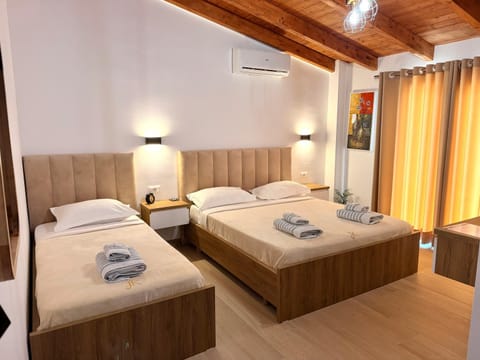 Bed, Photo of the whole room, Bedroom, towels, air conditioner