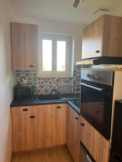 Kitchen or kitchenette, stove