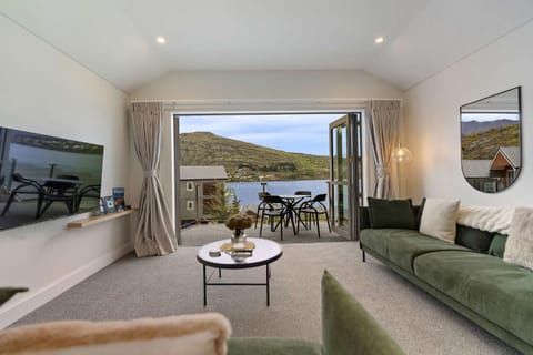 Natural landscape, TV and multimedia, Living room, Seating area, Lake view, Mountain view