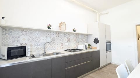 Kitchen or kitchenette, oven, stove