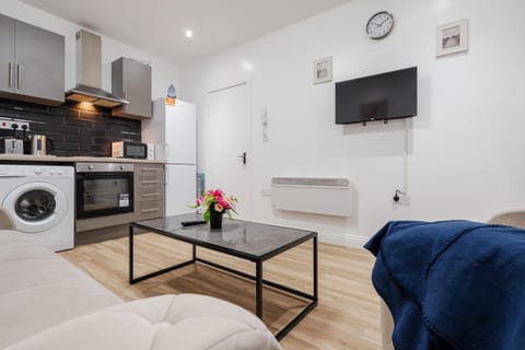 TV and multimedia, Living room, Seating area, washing machine, kitchen