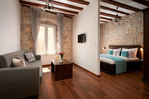 Bed, Living room, Seating area, Bedroom