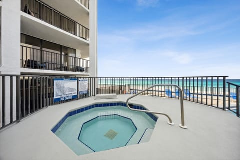 Property building, Natural landscape, Hot Tub, View (from property/room), Balcony/Terrace, Beach, Guests, Guests, Guests, Sea view, Area and facilities, children, children, children, young children, young children, young children, older children, older children, older children, group of guests, group of guests, group of guests, Family, Family, Family, sunbed