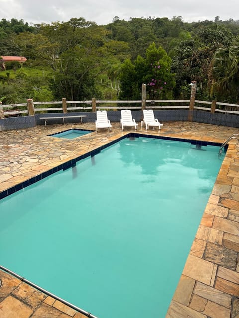 Swimming pool, sunbed