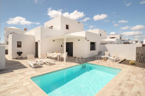 Property building, Patio, Day, View (from property/room), Balcony/Terrace, Swimming pool, Swimming pool, sunbed