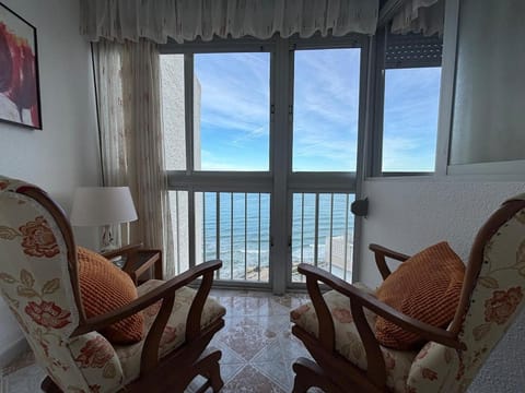 Natural landscape, View (from property/room), Living room, Seating area, Sea view