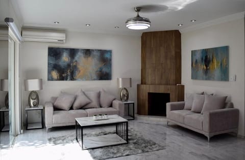 Living room, Seating area, fireplace, air conditioner