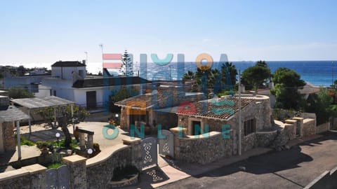 Property building, Nearby landmark, Day, Natural landscape, City view, Sea view
