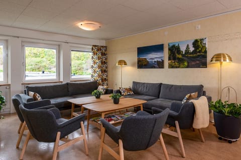 Property building, Communal lounge/ TV room, Living room, Seating area, Dining area