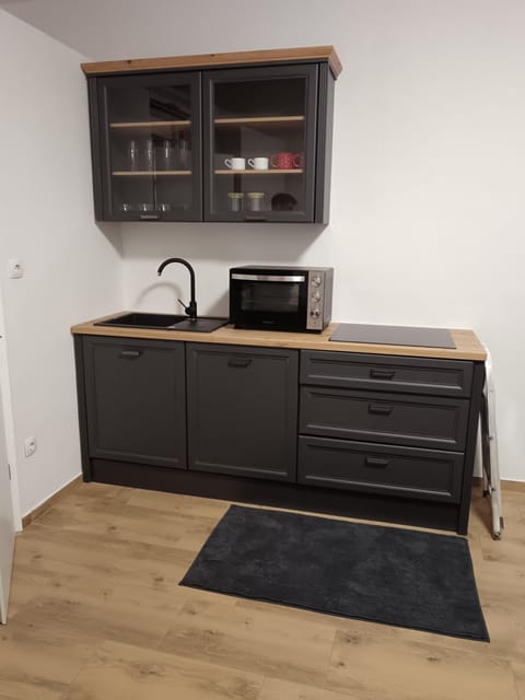 Kitchen or kitchenette, stove