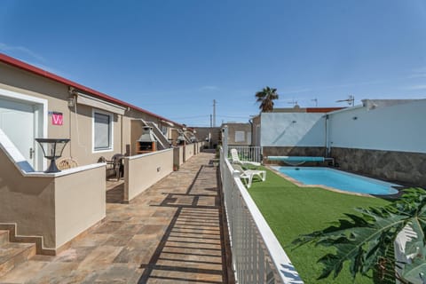 Property building, Living room, Swimming pool
