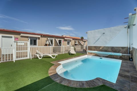 Property building, Living room, Swimming pool
