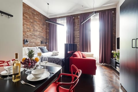 Bed, Coffee/tea facilities, Kitchen or kitchenette, Living room, Food and drinks, Photo of the whole room, Seating area, Dining area, Bedroom, Food, Drinks
