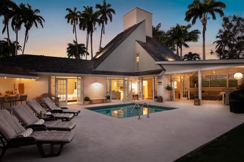 Property building, Patio, Night, Pool view, Swimming pool, sunbed