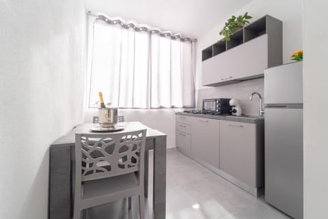 Kitchen or kitchenette, stove