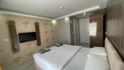 Bed, Bedroom, towels, wardrobe, air conditioner