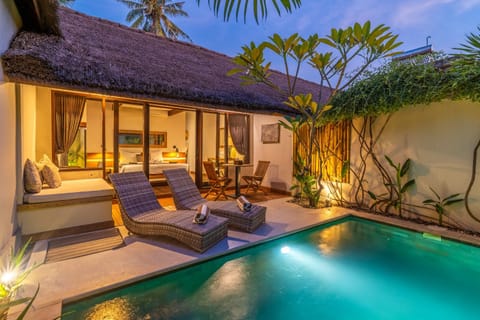 Property building, Patio, Seating area, Bedroom, Pool view, Swimming pool, sunbed, towels